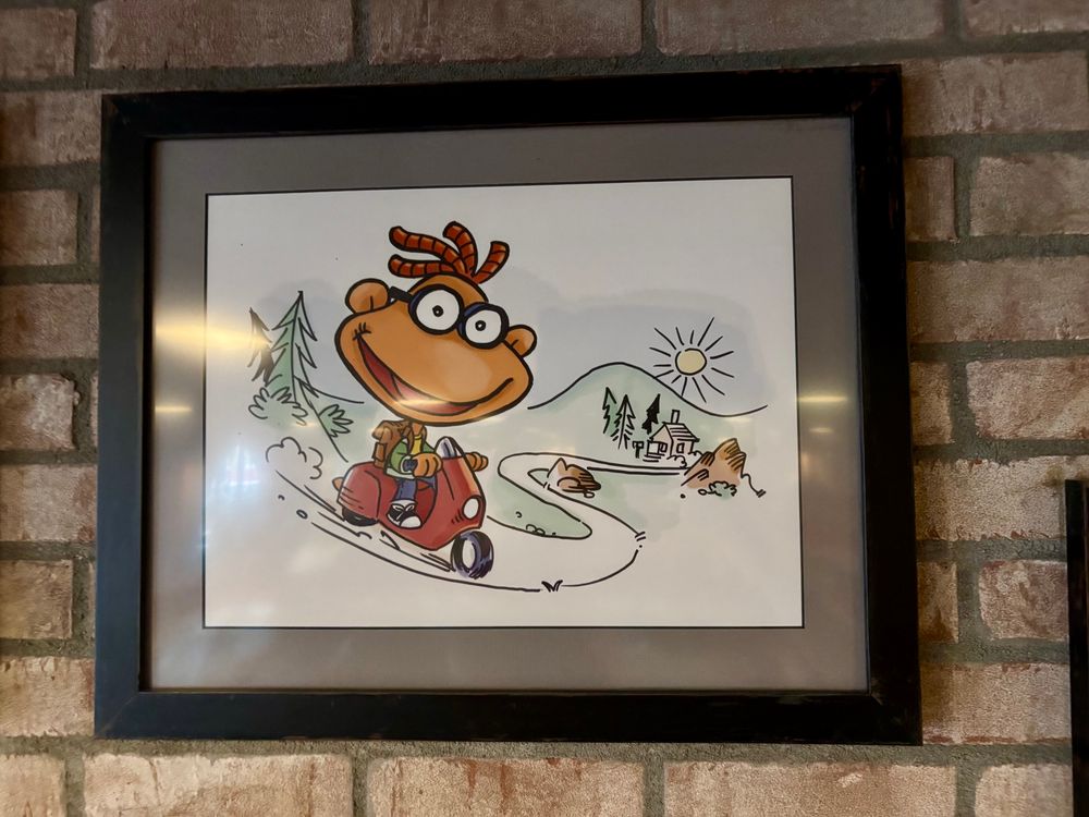 A drawing of the Muppet Scooter hanging in Pizzerizzo on its final day of operation. 