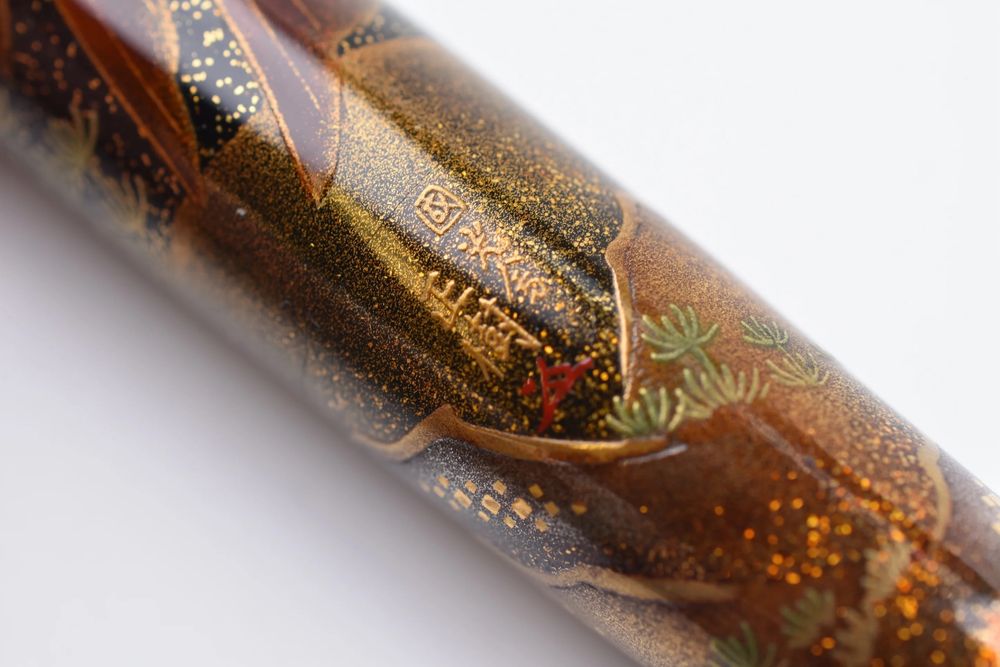 A close-up of the incredibly, insane level of detail. Every single glittery bit is a tiny piece of eggshell that was placed by hand and inlaid by hand.