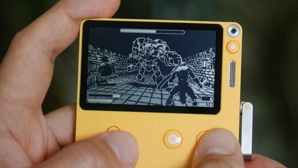 A 1-Bit game on the Playdate handheld. A knight is standing battle ready across a giant stone monster