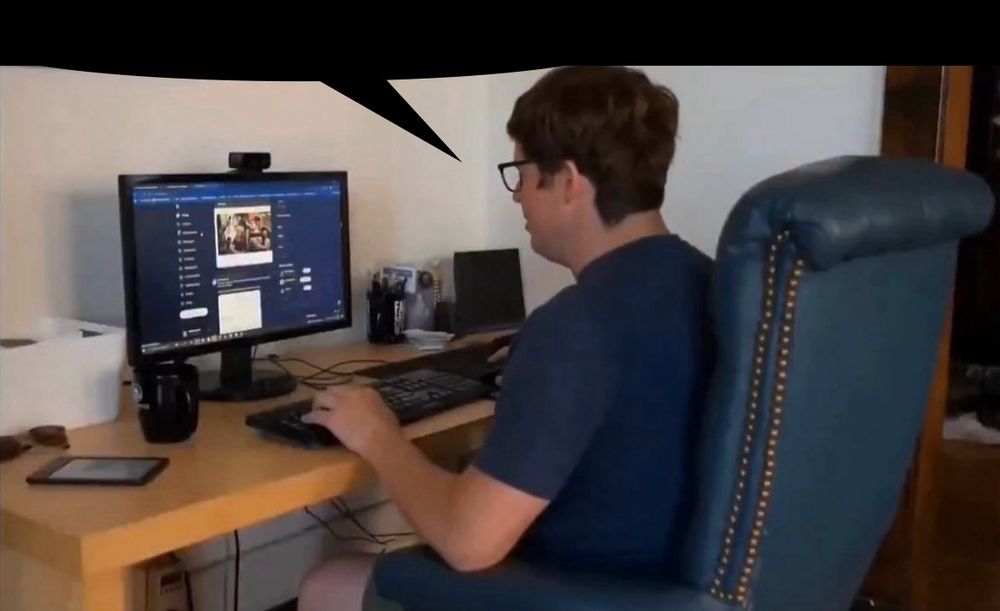 Will Stancil sits in front of a computer on his desk. he sits in his fancy blue chair. he hunches over the keyboard as he uses twitter. a speech bubble has been added above his head.