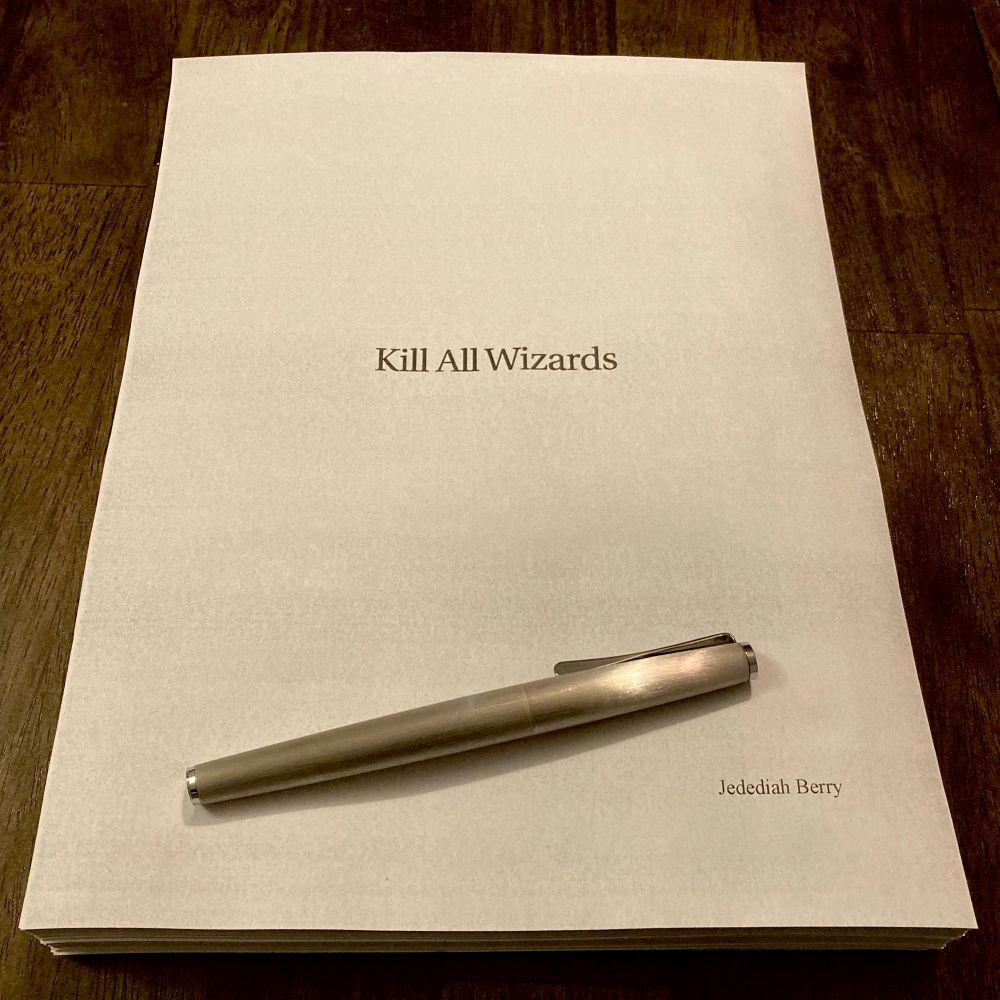 Printed manuscript bearing the title KILL ALL WIZARDS. Also a brushed metal fountain pen.
