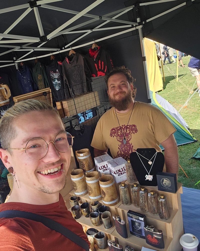 Picture of me and Josh grinning like muppets on our stall at Evesham Medieval festival.