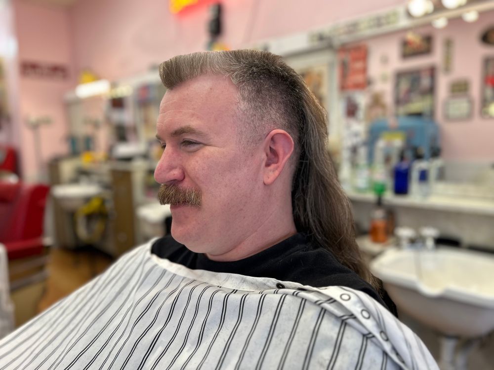 Side profile of a flat top mullet 
