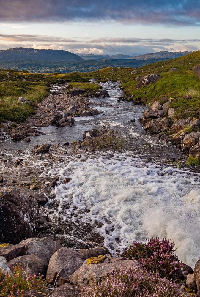 Fast flowing river high in the mountains.
