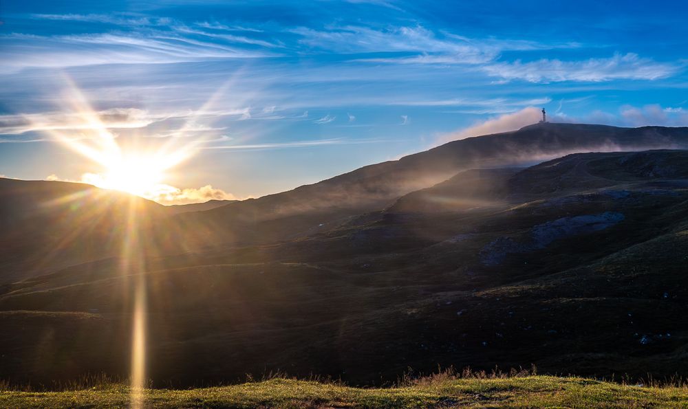 Sun hills and mist.