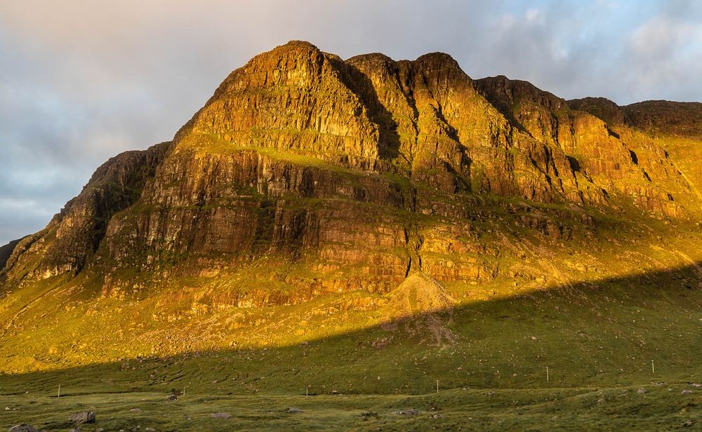 Tall rocky cliff.