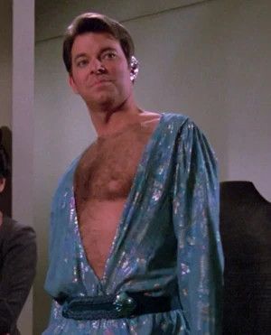 Will Riker wearing a v neck that goes almost down to his dick