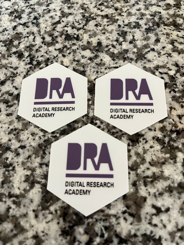 Three buttons with DRA written on them