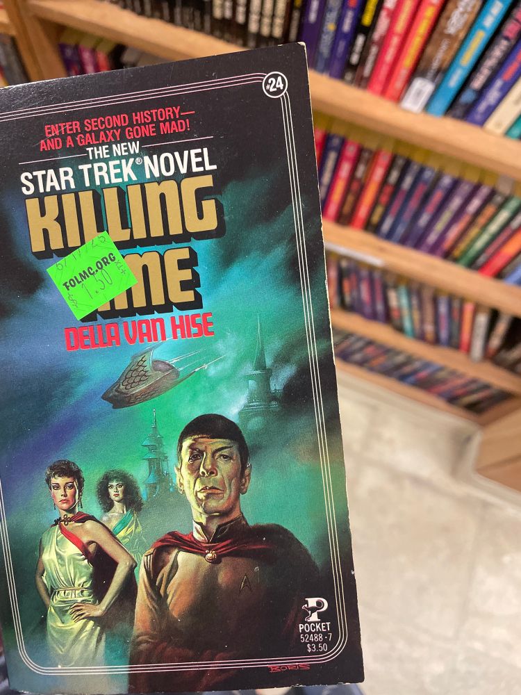 A photo of the cover of a Star Trek novel titled Killing Time by Della Van Hise. 