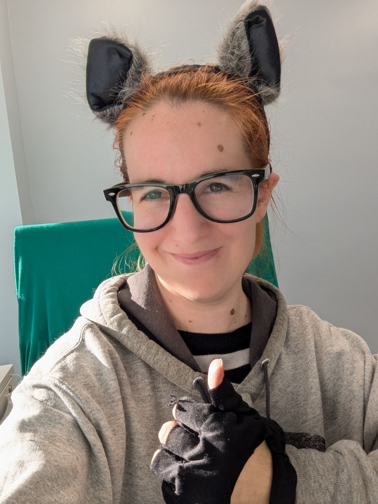 Me dressed like a raccoon at work. My glasses are my mask because if I wore a mask and couldn't wear my glasses, I wouldn't get any work done 