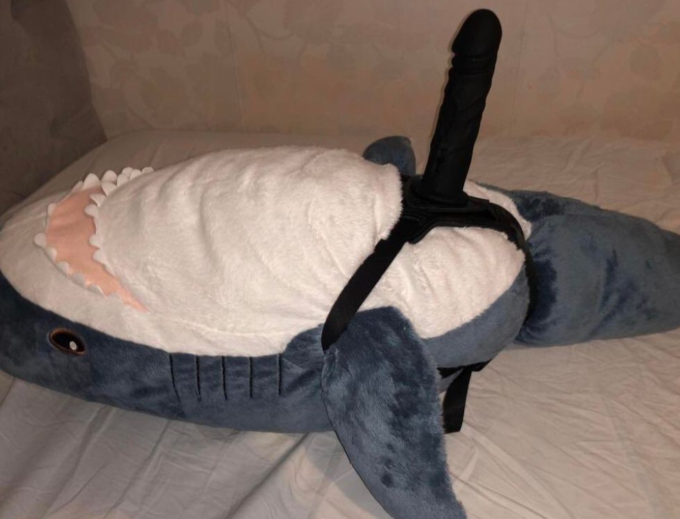 blahaj with a strap