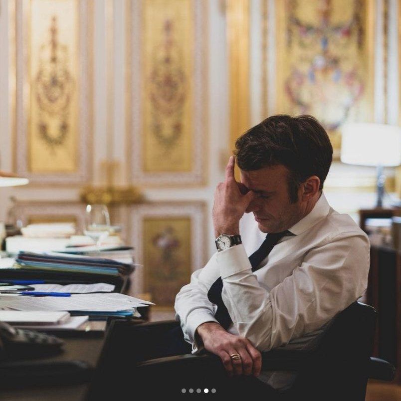 emmanuel macron going depresso mode but this time in a chair