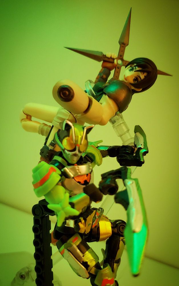 Same picture and pose as previous, but with a green glow from the colorful crystal light from earlier posts.