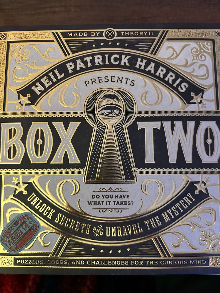 The dazzling cover art for Box Two, a puzzle game by Neil Patrick Harris and Theory11.