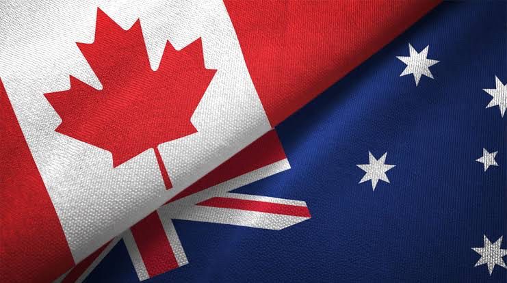 The Canadian flag diagonally overlayed on the Australian flag.