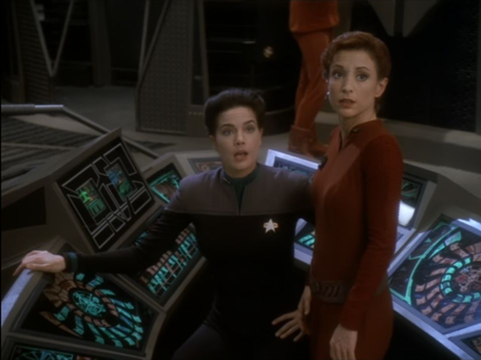 Jadzia and Kira are standing next to each other in ops
