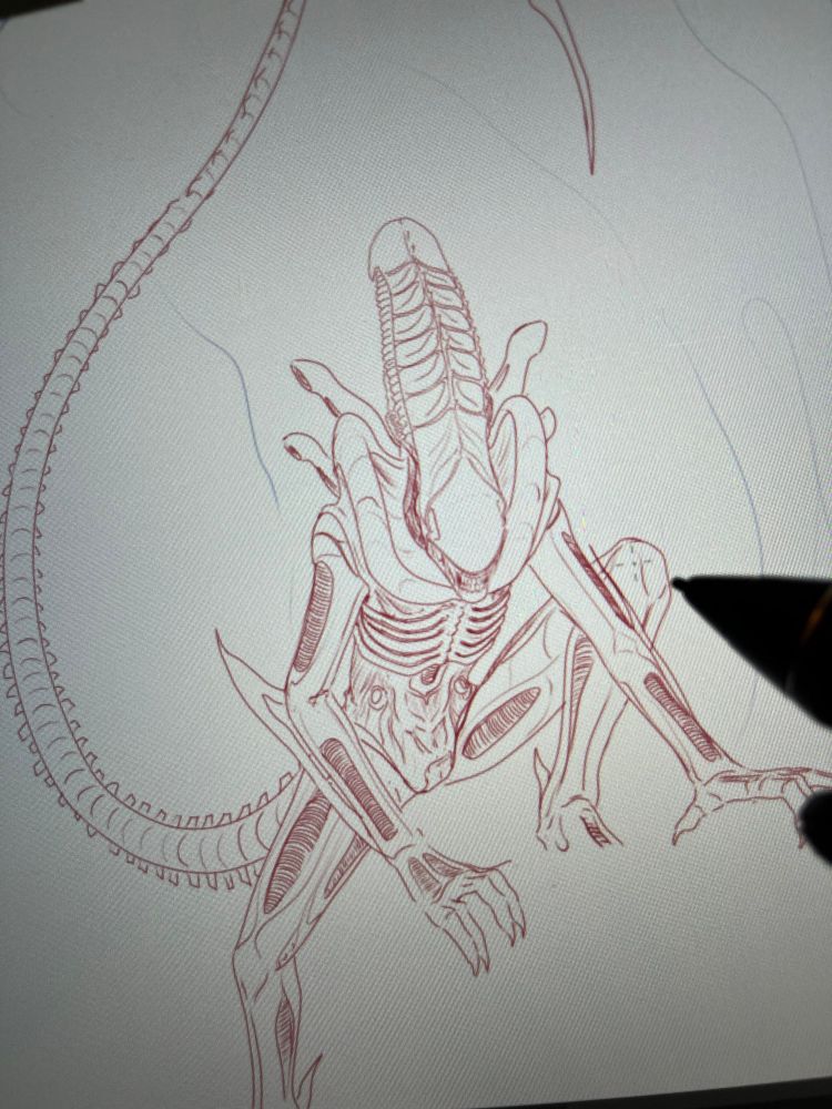 A photo of an in progress digital drawing of a xenomorph. The xenomorph appears crouched in a threatening posture, its tail curved menacingly above its head.