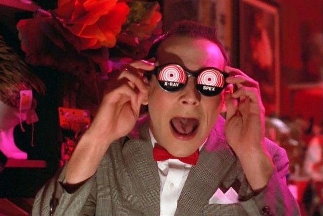 Pee Wee Herman perving on a lady with x-ray glasses
