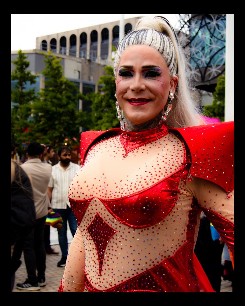 Parade participant in shiny red
