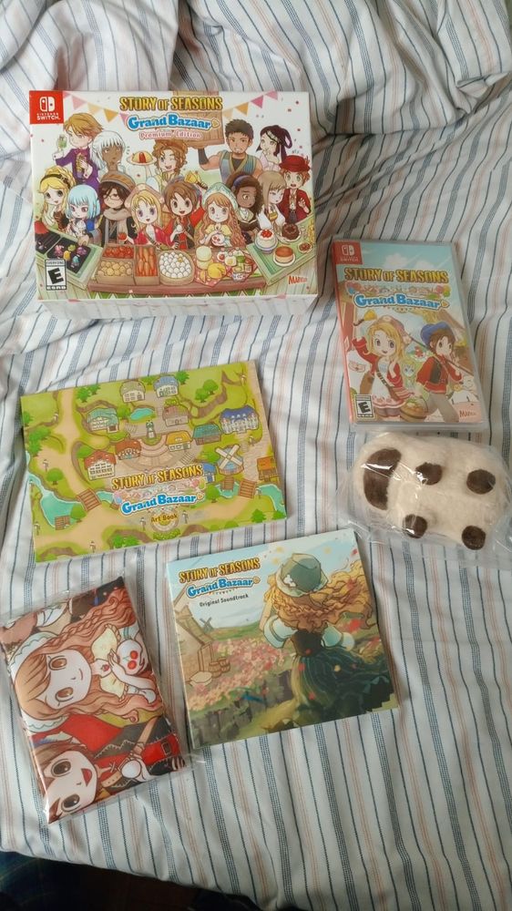 the story of seasons premium edition box contents! Game, plushie, artbook, soundtrack and cloth poster