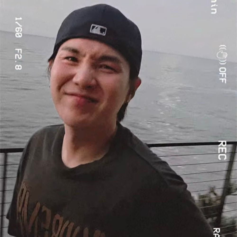 yoongi making a cutie funny face in hobi’s instagram video, backwards ball cap, supreme shirt 