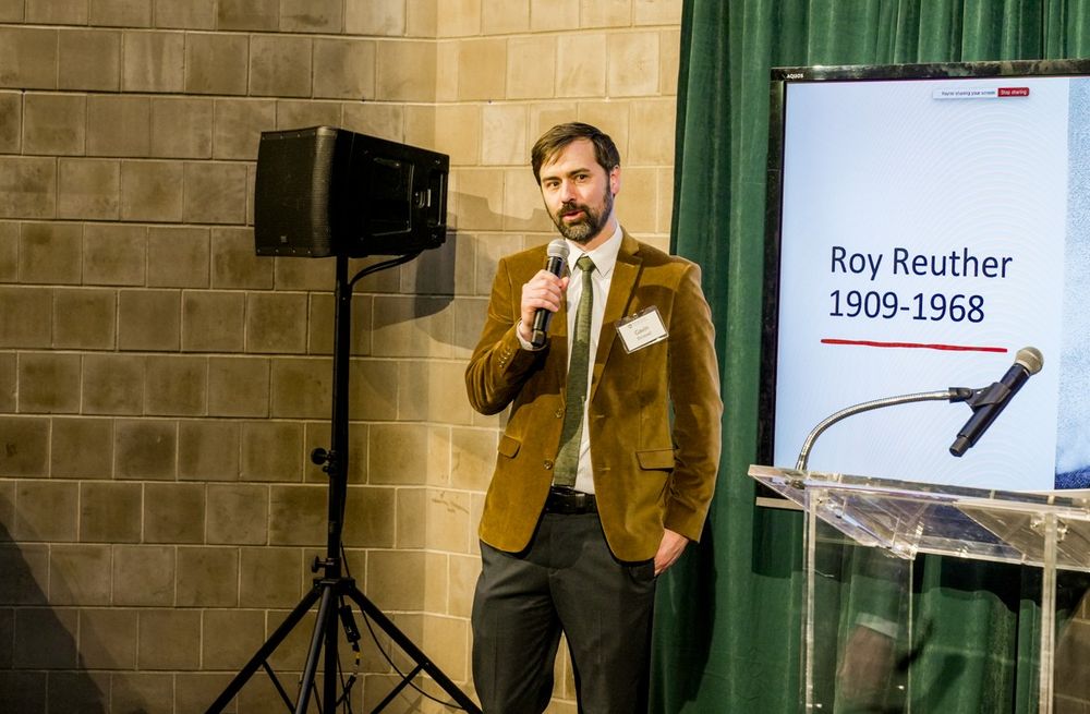 Photo of UAW Archivist Gavin Strassel speaking during an event at the Walter P. Reuther Library discussing Alan Reuther's new book: "Roy Reuther and the UAW: Fighting for Workers and Civil Rights." March 27, 2025. 
