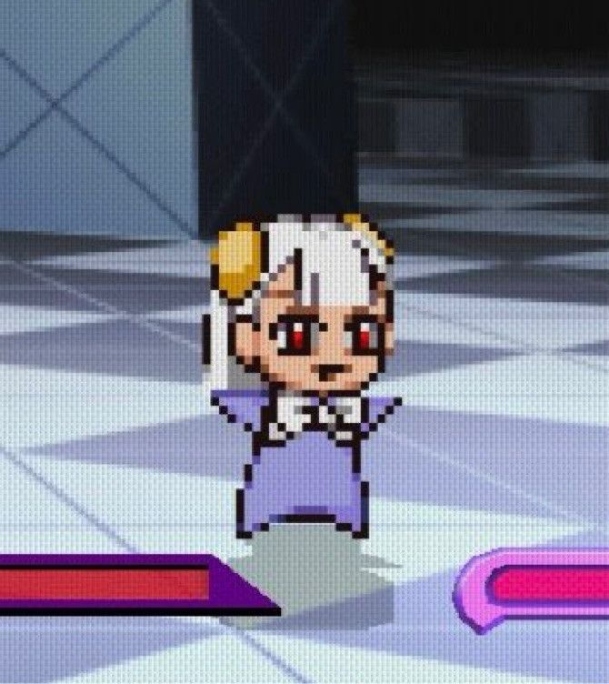 This screenshot depicts Stupid Ingrid Baby from Capcom Fighting Evolution/Jam standing on a checkered floor between two indiscernable super meters
She stands wide eyed and smiling. Forgetting the fact that she is in the middle of a fight against Anakaris, who was the one that turned her into a stupid baby, and that she will be sent straight to hell (as the post caption says)