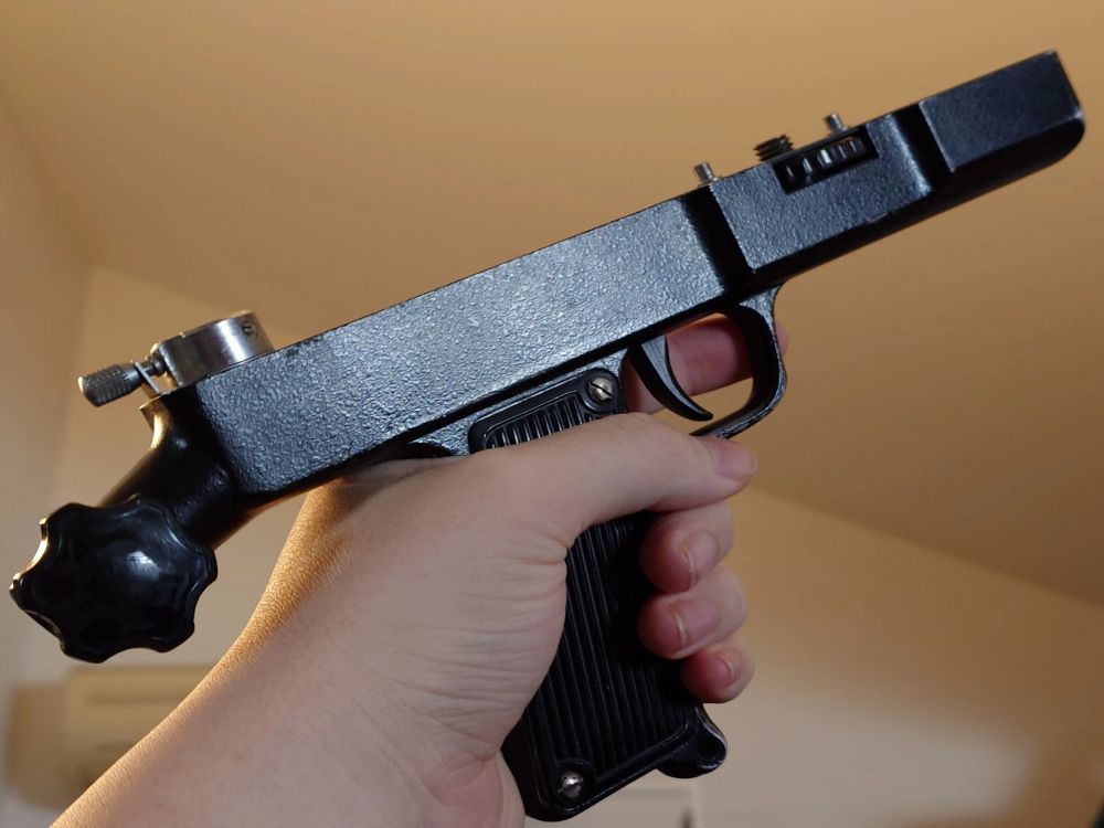 pistol grip part of a TAIR-3S lens, part of a Zenit FOTOSNAIPER-12