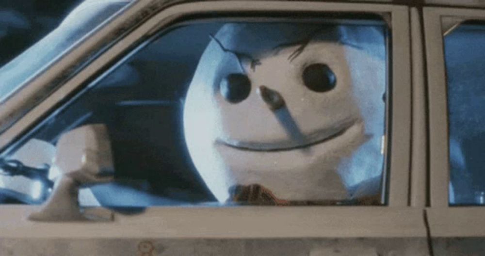 jack frost is sitting in a car with his head out the window