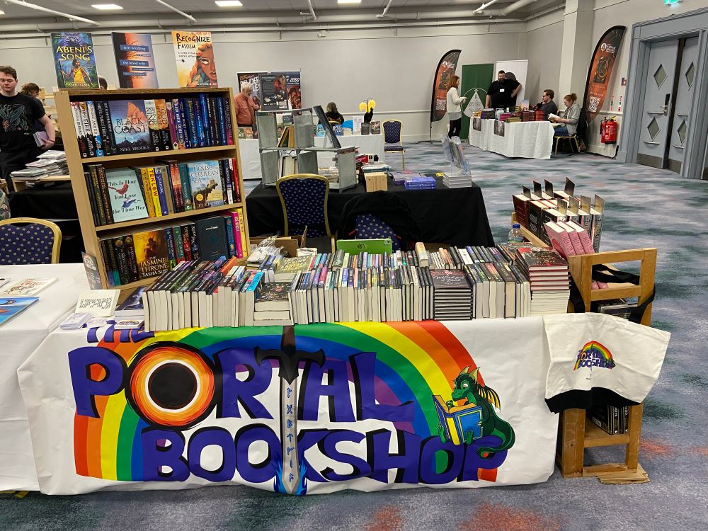 The Portal Bookshop stall, laden with so many books