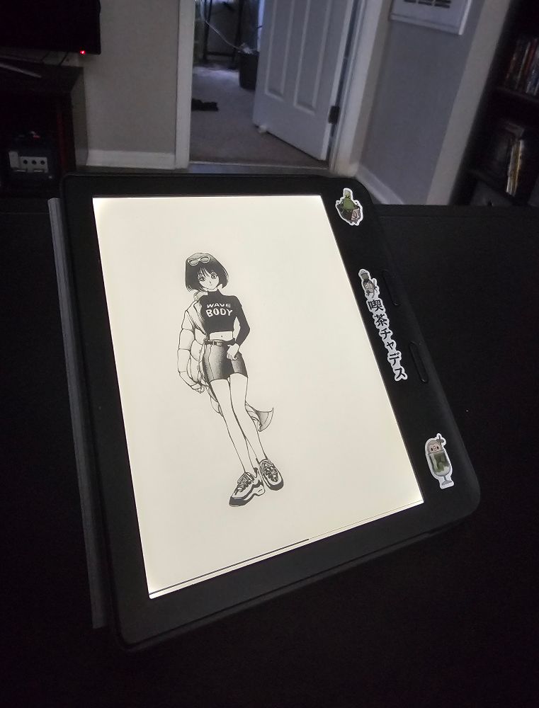 Nobody ereader sitting open to a page with Anzu/Tea from the Yu-Gi-Oh! Manga