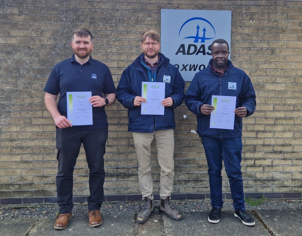 Toby, Jack, James standing outside with ADAS Boxworth office with their BASIS certificates