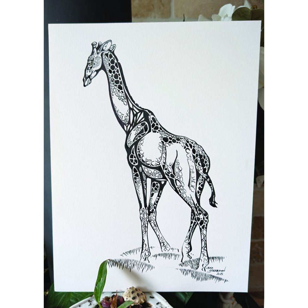 black and white ink drawing of a highly stylized giraffe walking to the left and slightly away from the viewer - art is seen perched against a tile background