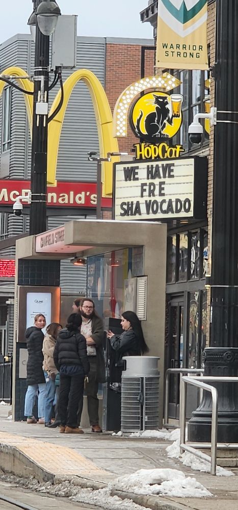 Hop cat sign that says fre sha vacado