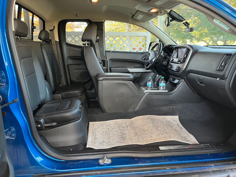 A pickup truck cab without a passenger seat