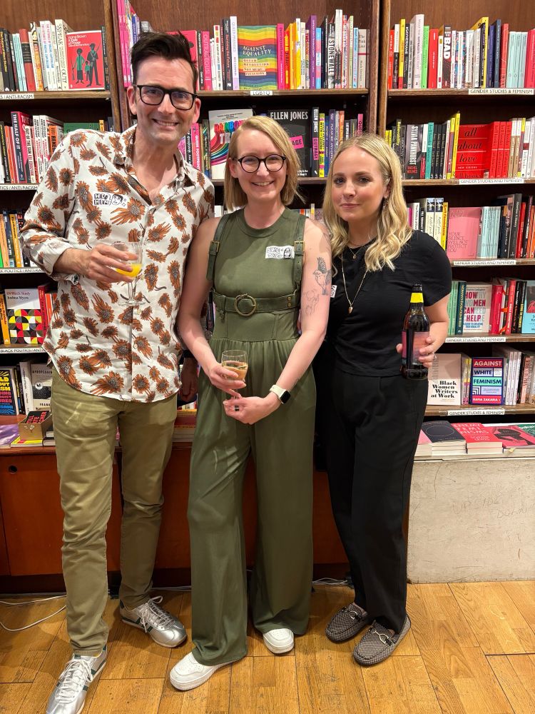 David and Georgia Tennant stand with LD Lapinski during the launch party of KICKFLIP 