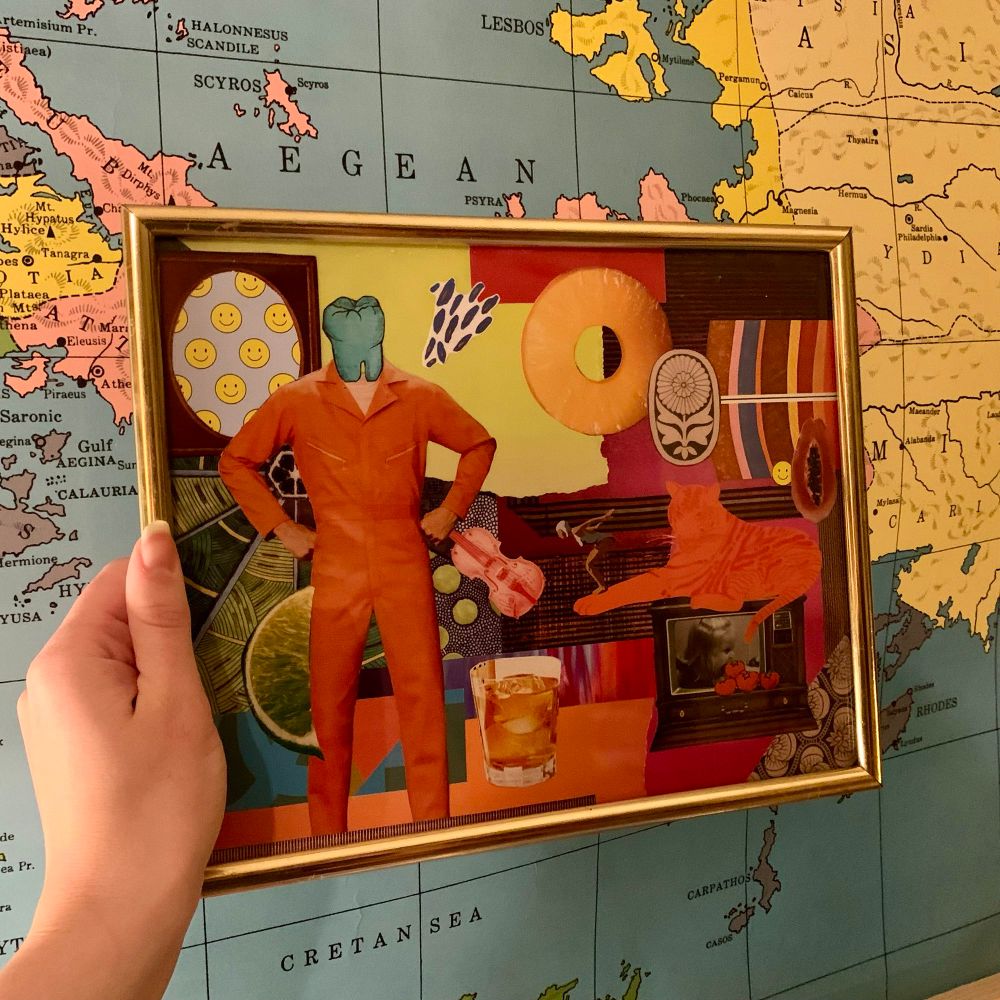 Colorful collage frames in a simple brass frame. Some elements of the collage include a man’s body in an orange jumpsuit with a blue tooth where his head should be, a woman’s figure diving off of a tiger into a glass of whiskey, and a little girl eating tomatoes on tv. 