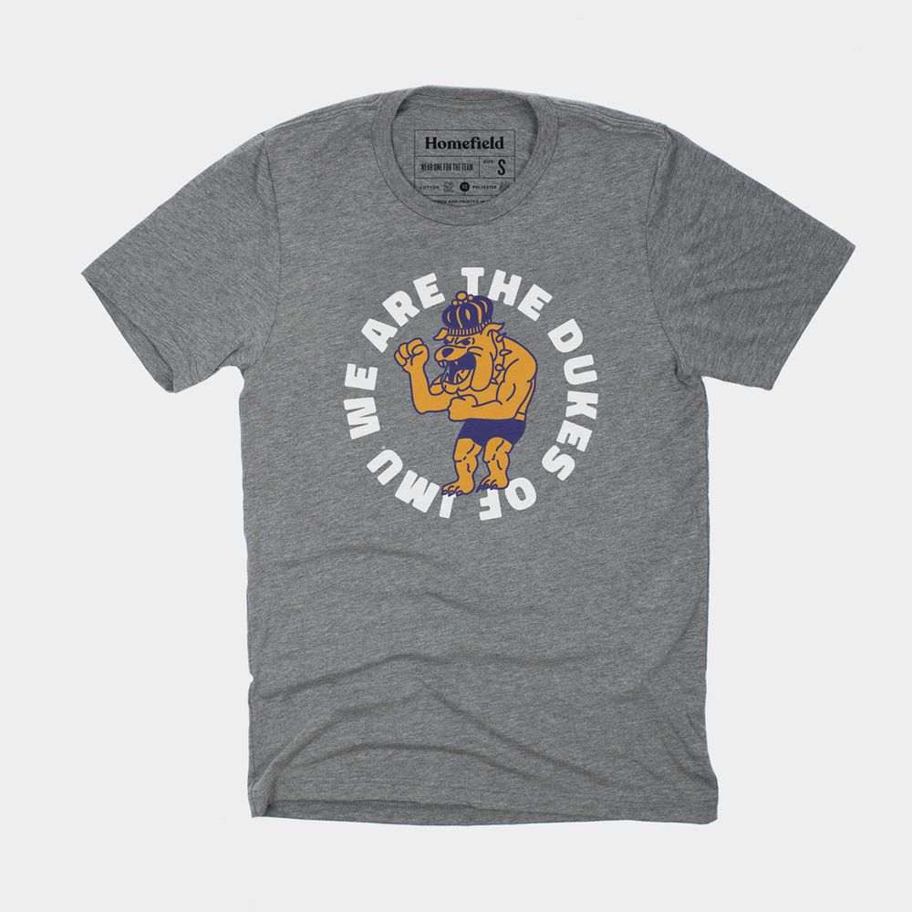 A grey t-shirt that says “WE ARE THE DUKES OF JMU” in white type, with a cartoon boxing bulldog wearing a crown