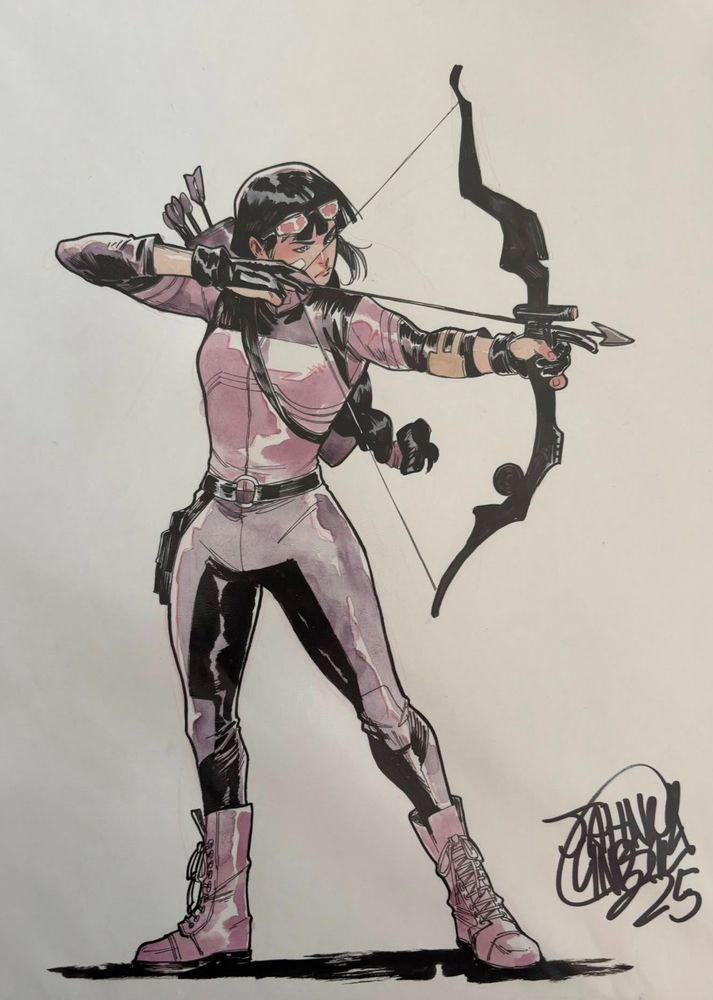 Hawkeye Kate Bishop with her bow cocked and aimed to the left