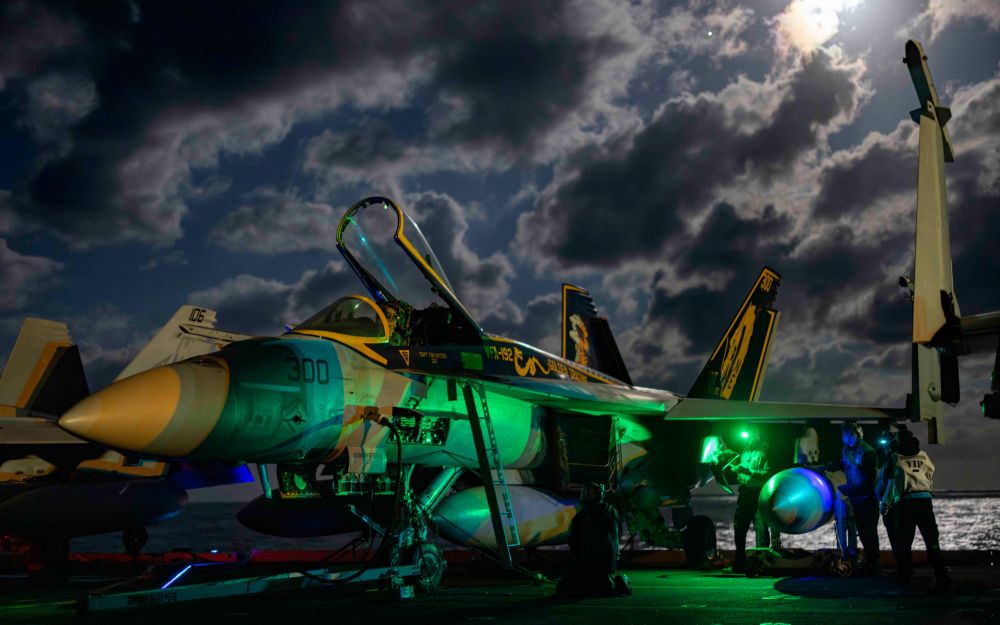 PHILIPPINE SEA (Dec. 15, 2024) – Sailors prepare an F/A-18E Super Hornet, assigned to the “Golden Dragons” of Strike Fighter Squadron (VFA) 192, for flight operations on the flight deck of the Nimitz-class aircraft carrier USS Carl Vinson (CVN 70), Dec. 15, 2024. Vinson, the flagship of Carrier Strike Group ONE, is underway conducting routine operations in the U.S. 7th Fleet area of operations. (U.S. Navy photo by Mass Communication Specialist 2nd Class Isaiah B. Goessl)