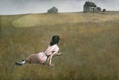 Young, thin, dark-haired woman in a pale pink dress lying in a field, looking back toward a farmhouse in the distance. 