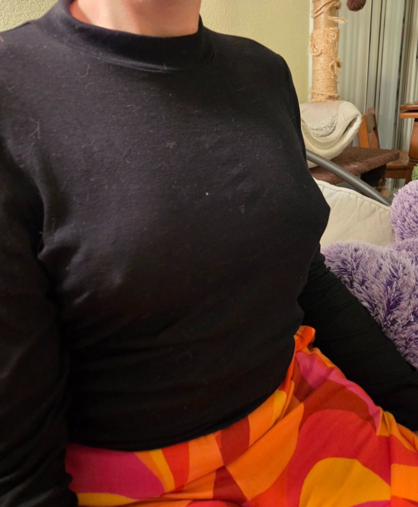 Me in a black sweater that makes my tits look awesome