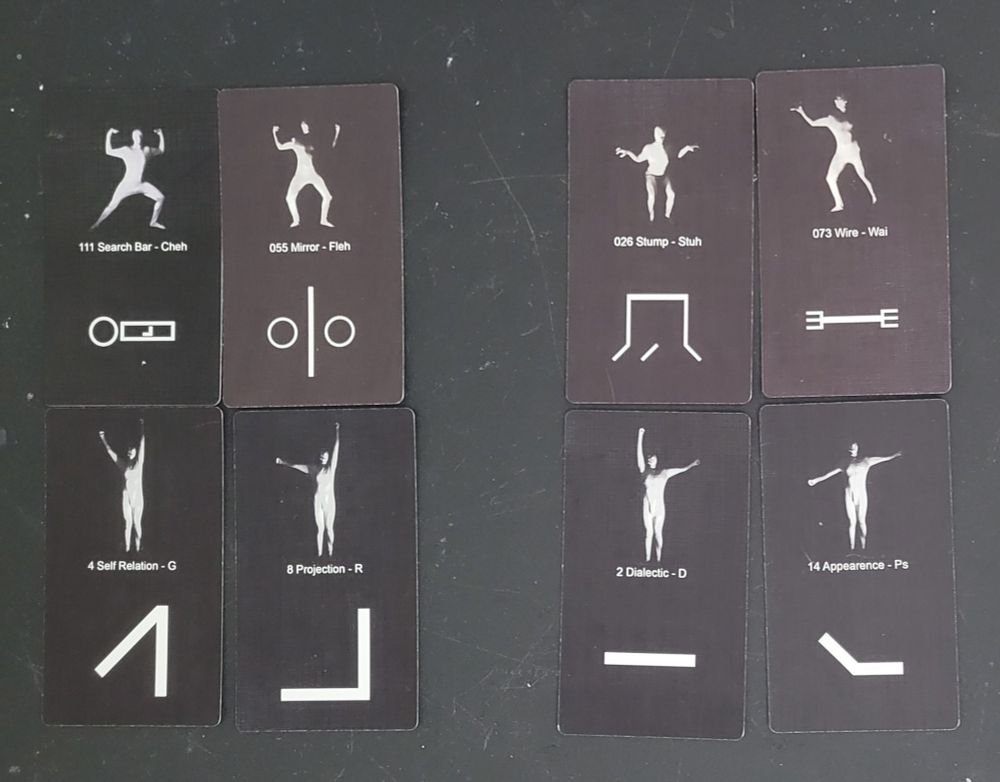 8 vaibbahk oracle cards depicting the postures, glyphs, and phonetics of a phrase in vaibbahk. Romanization and translation in the post