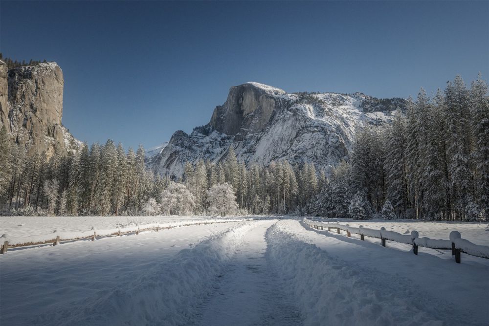 Fresh snow covering the road below Half Dome and Washington Column.