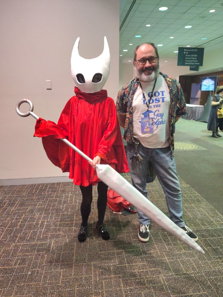 The author and a cosplayer dressed as Hornet from Silksong