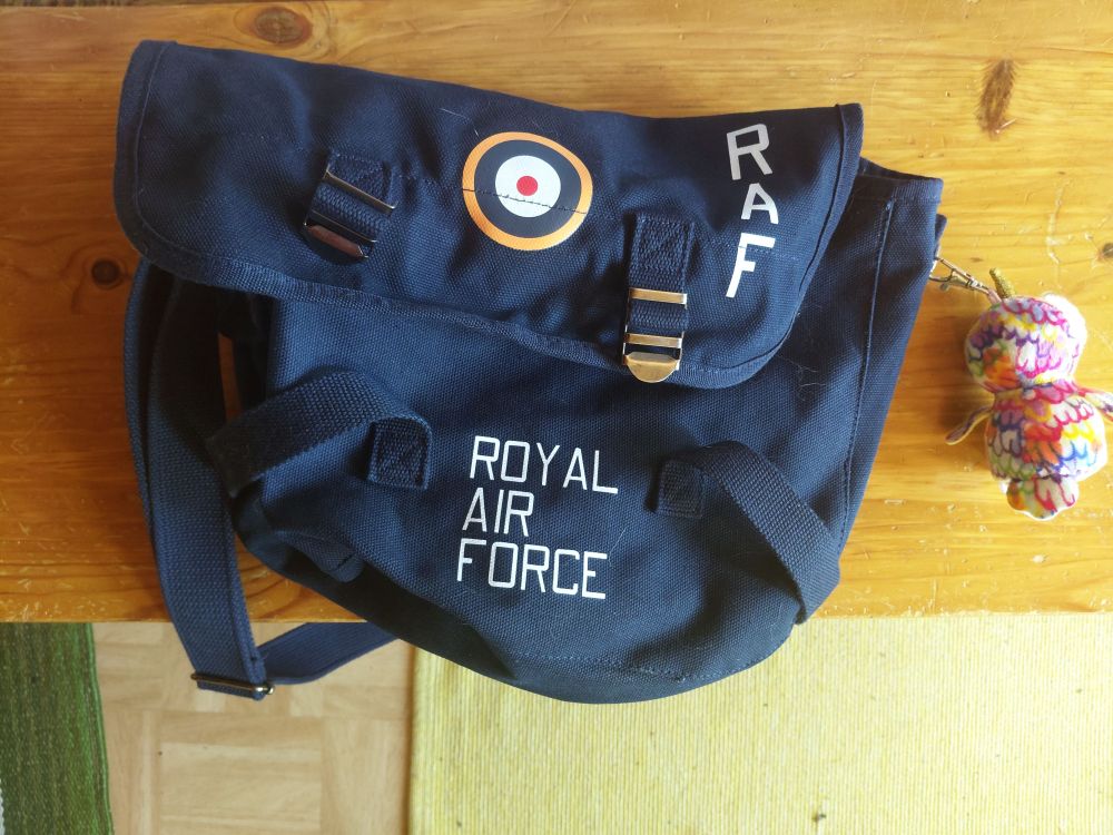 A blue shoulder bag marked with text 'Royal Air Force' and a RAF roundel.
