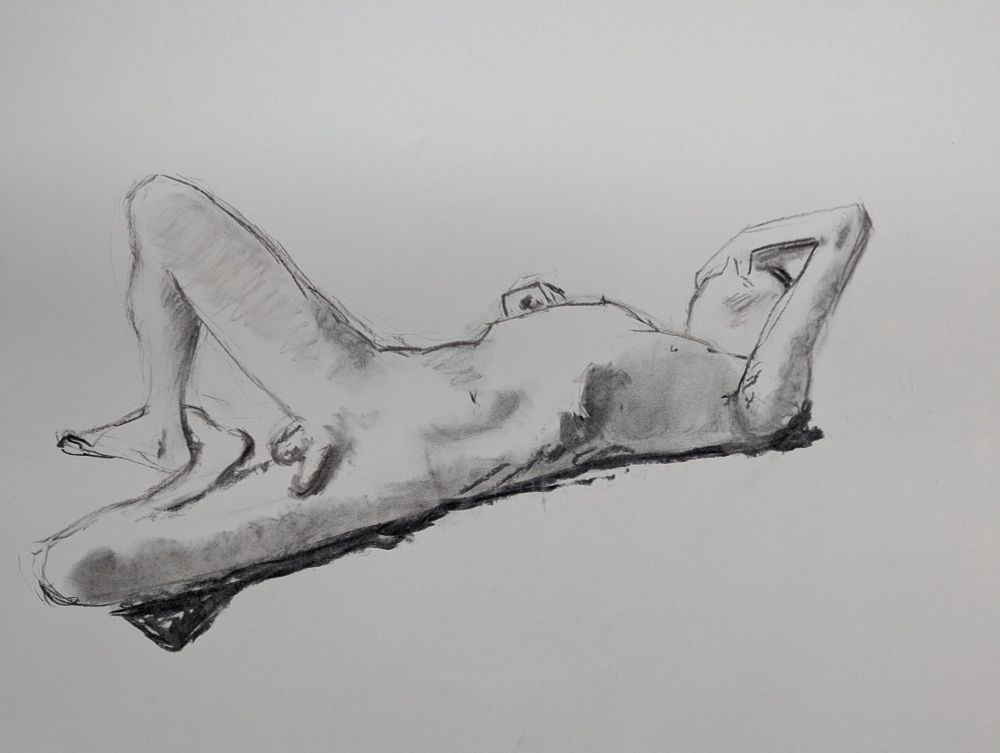 20 minute Charcoal sketch of a naked man laying on his back. Right knee bent, left arm raised to rest on his head.