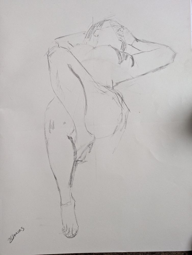 20 minute charcoal sketch on white paper of a reclining woman, one knee raised, hands behind her head.