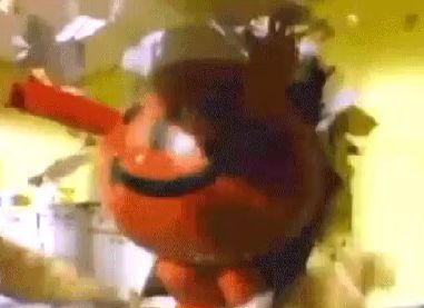 The Kool-Aid man bursts through an interior wall.