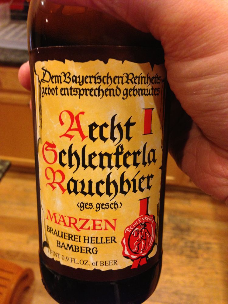 A bottle of Aecht Schlenkerla Rauchbier held in my hand